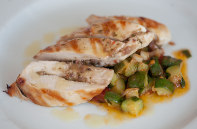 Grilled chicken breast filled with an aubergine and olive pesto and served with a homegrown ratatouille