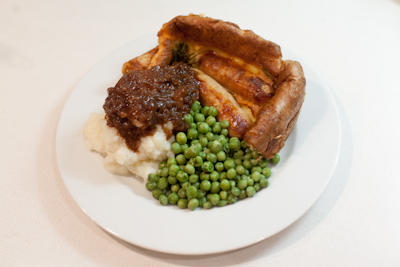 Toad in the hole with red onion gravy